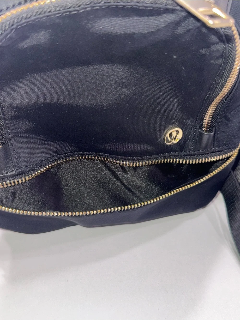 lululemon athletica Black Mini Backpack with Gold Zippers